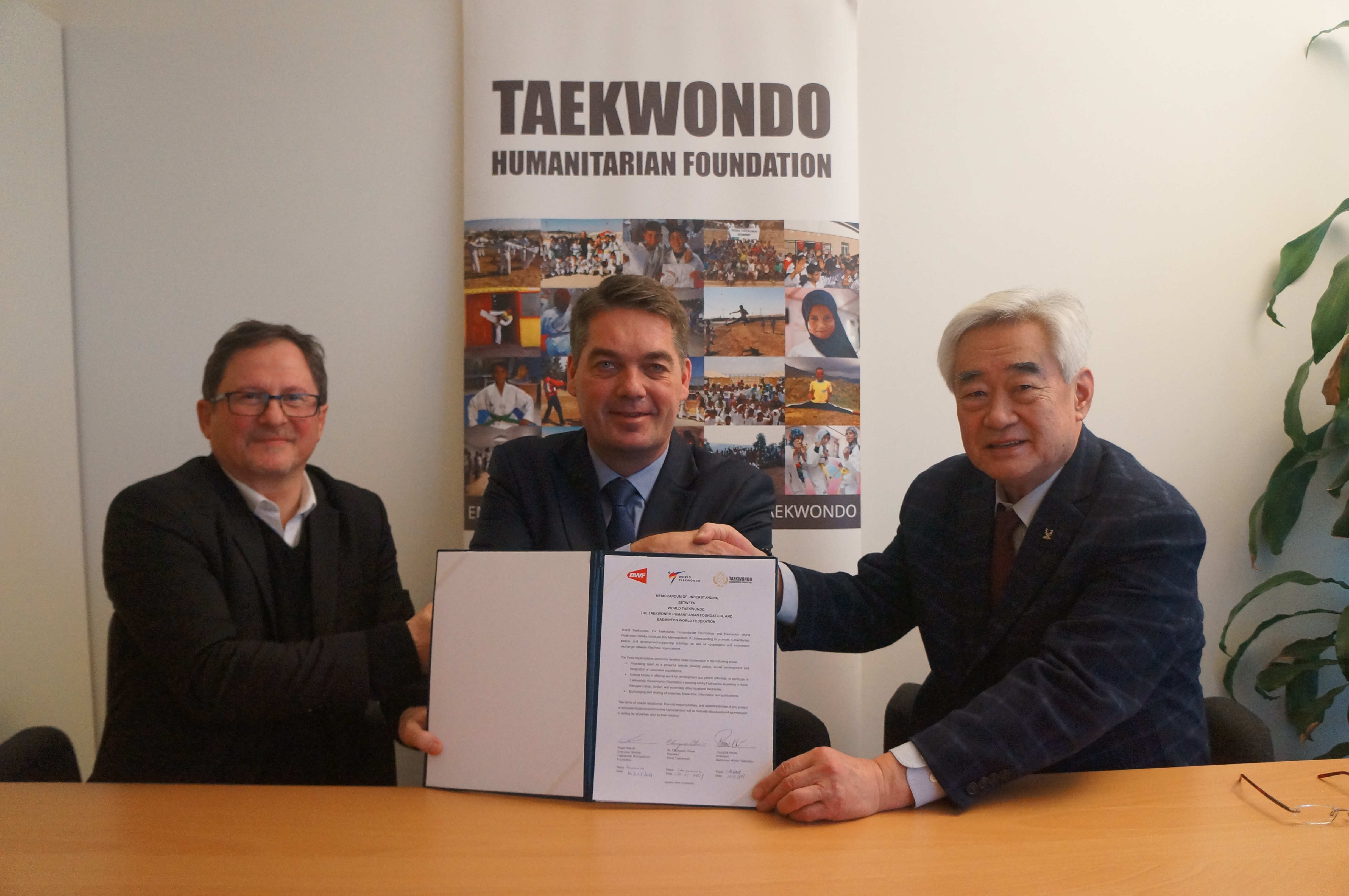WT President Dr. Chungwon Choue(right), BWF President Poul-Erik Høyer (middle) and THF Executive Director Roger Piarulli (left) poses after signing the MoU